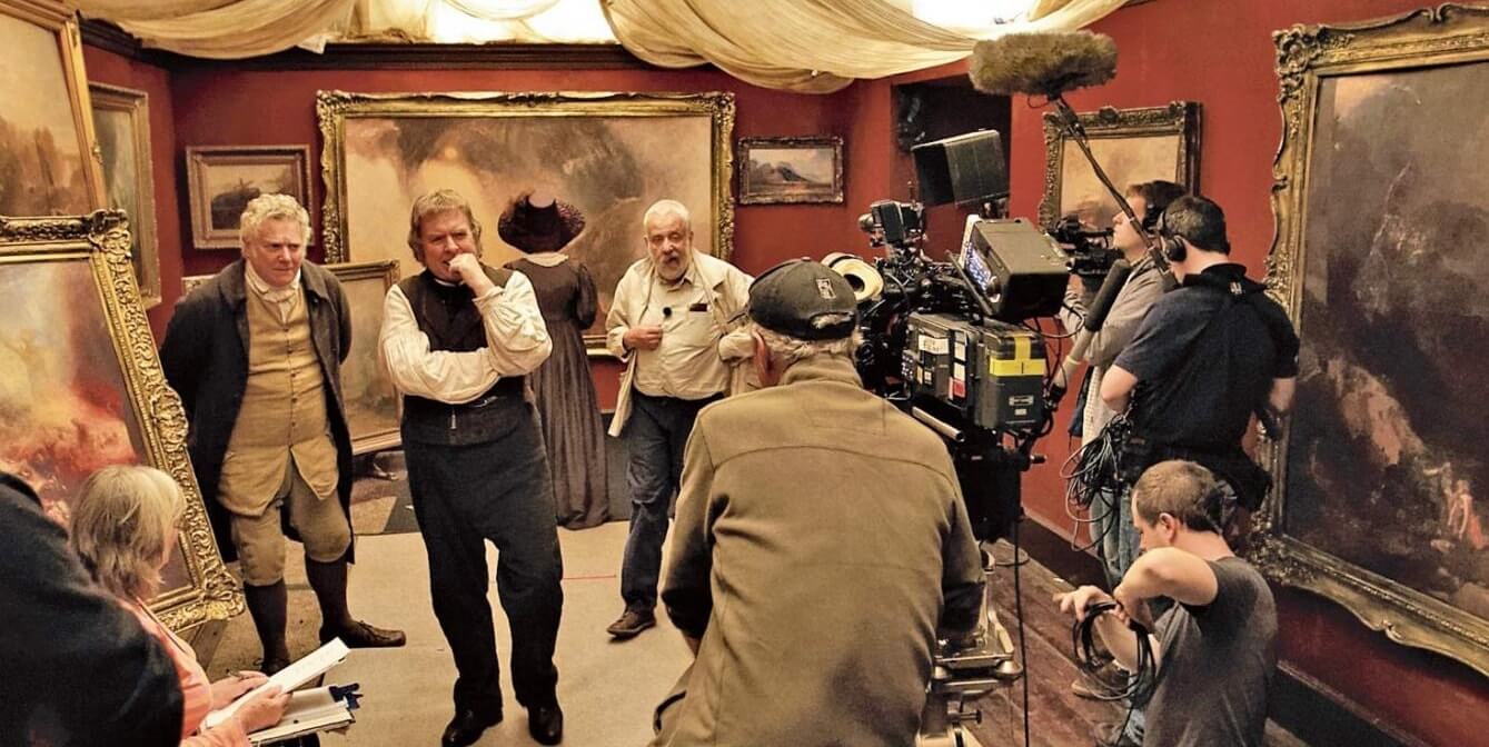 11 Ways to Become a Better Producer or Director on Set - Film Crew Collaborating