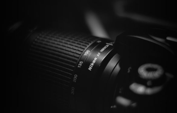 Best Nikon Camera Lenses - Header - StudioBinder
