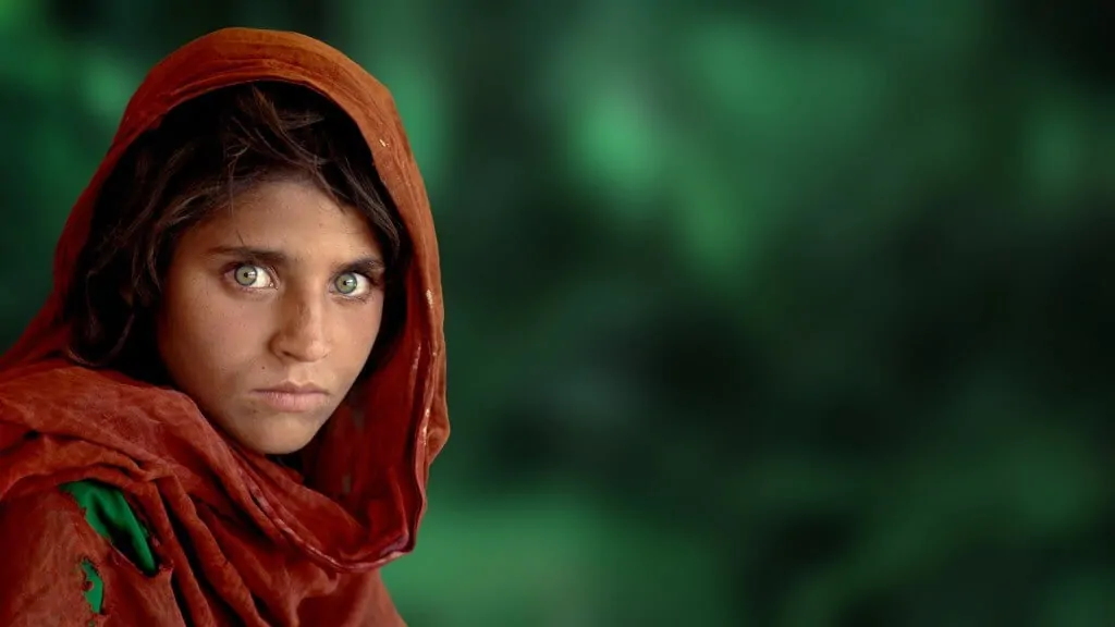 Focus on the eyes to take good portrait shots — Portrait by Steve McCurry