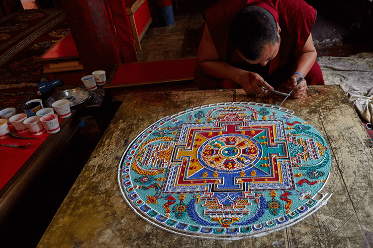 What is Radial Balance in Art Painting of a mandala — radial balance design