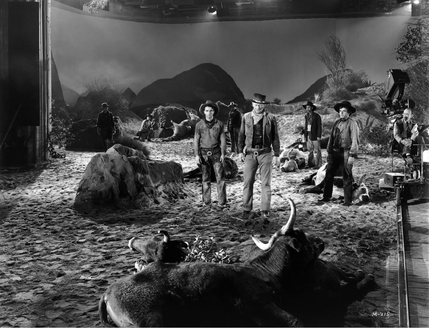 What is Production Design in Film Red River Montgomery Clift and John Wayne on the studio set together ()