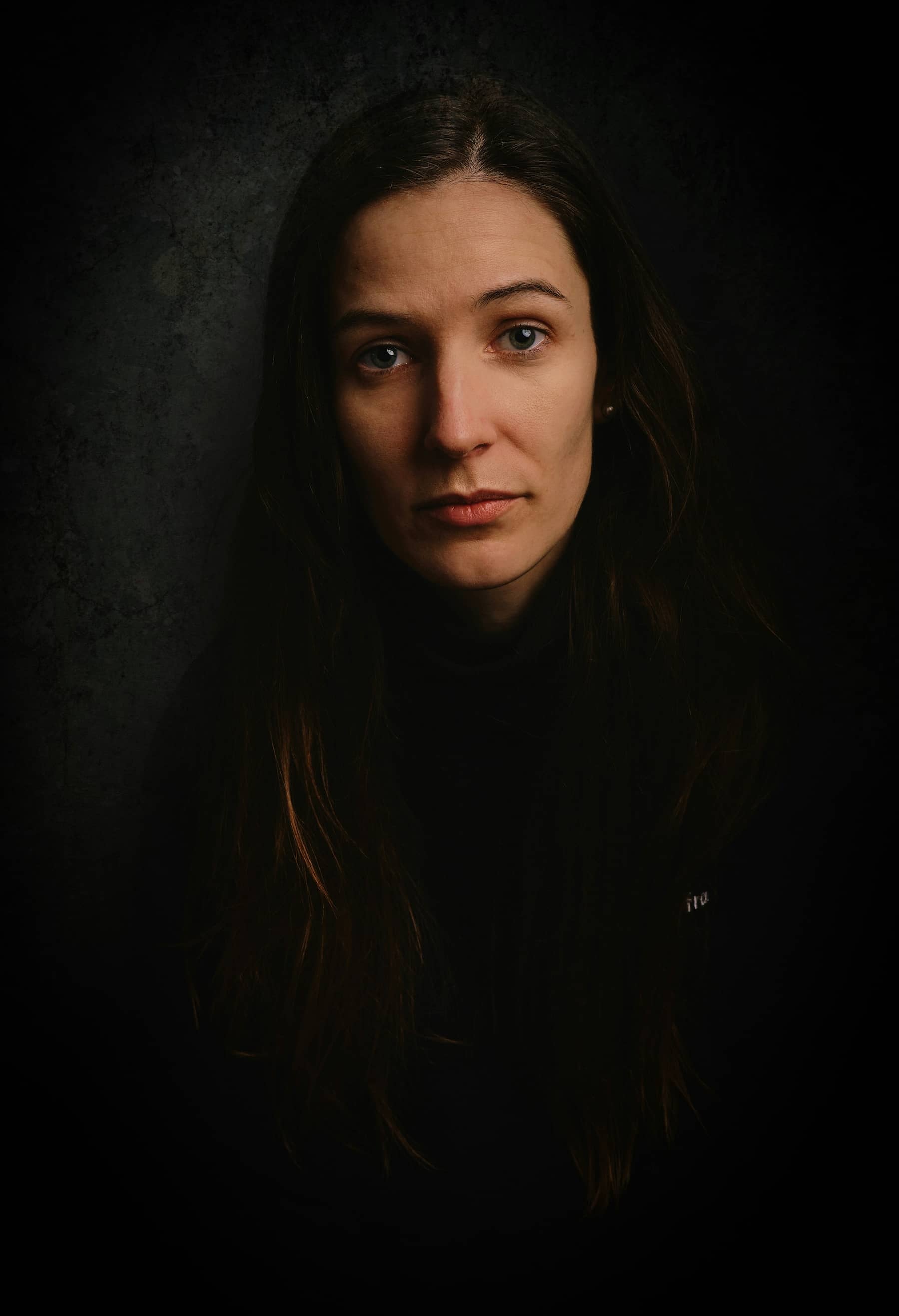 What is a Backdrop in Photography Black Backdrop Portrait
