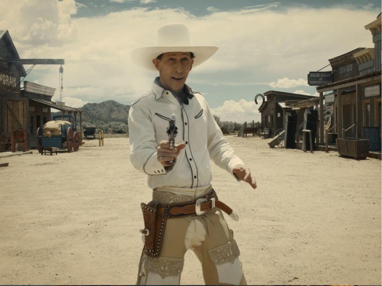 Cowboy Shot Example Featured CS of Tim Blake Nelson shooting from a revolver from The Ballad of Buster Scruggs