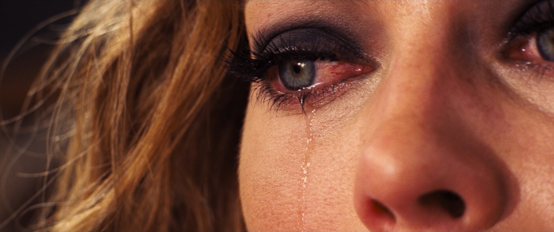 Extreme Close Up Shot Example ECU of Margot Robbie crying from Babylon