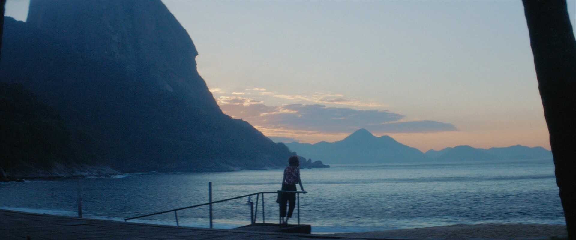 Extreme Wide Shot Example EWS of girl on the sunset beach from Invisible Life