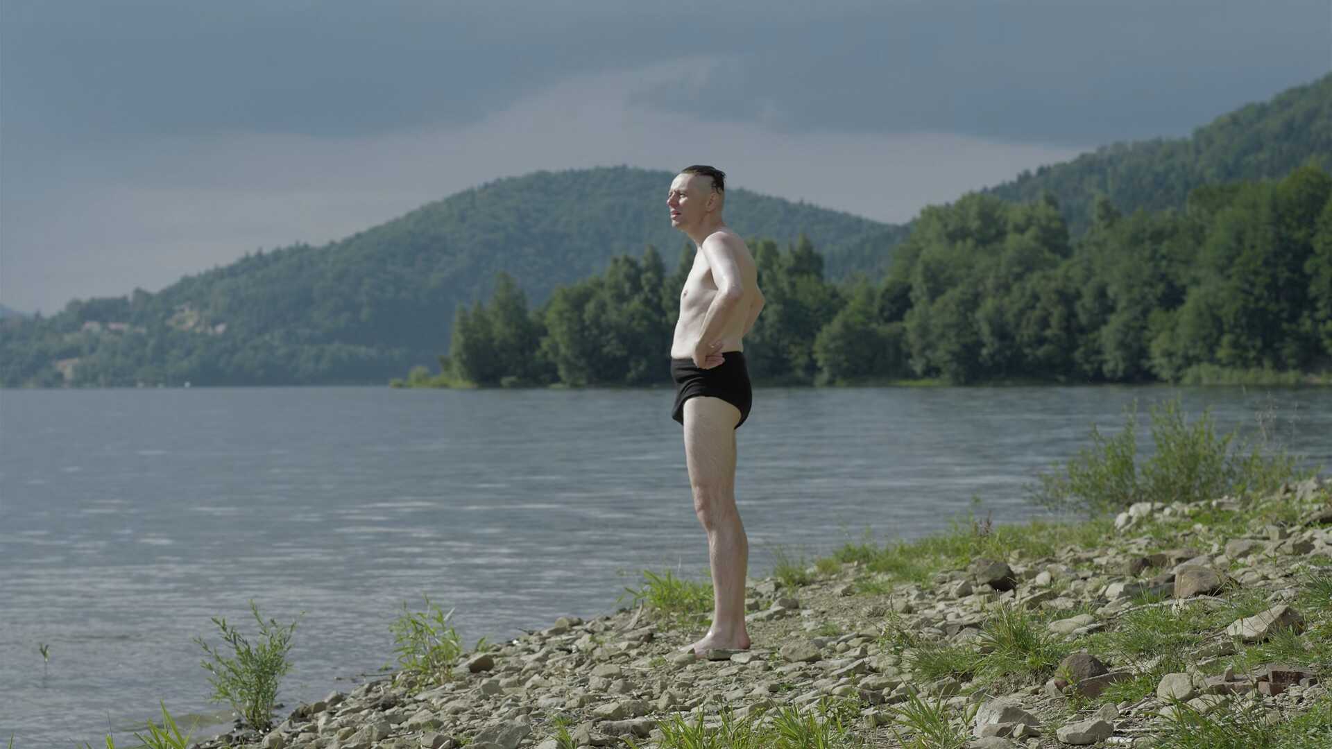 Wide Shot Example WS of Christian Friedel on a lake from The Zone of Interest