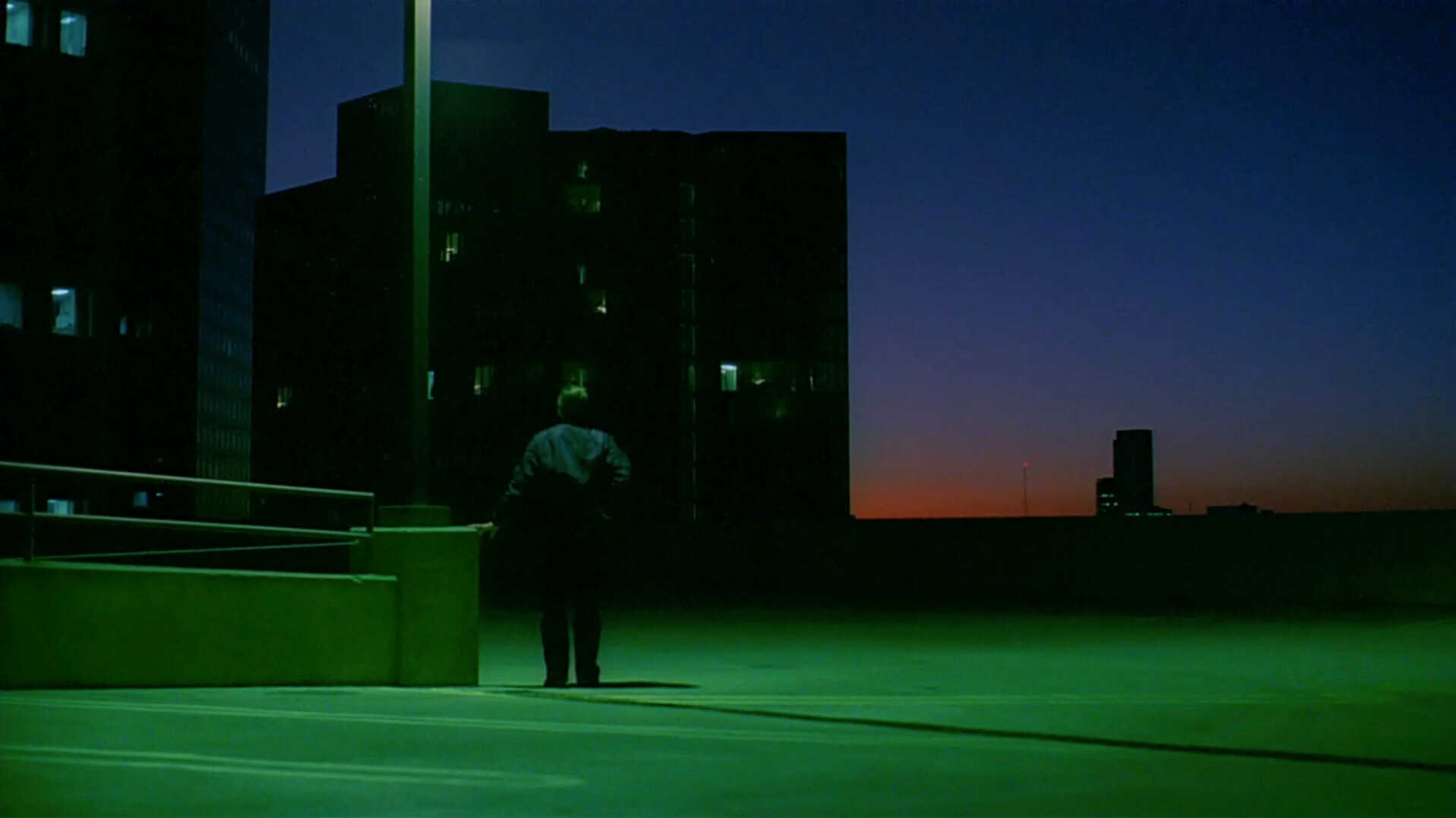 Wide Shot Example WS of green parking lot from Paris Texas