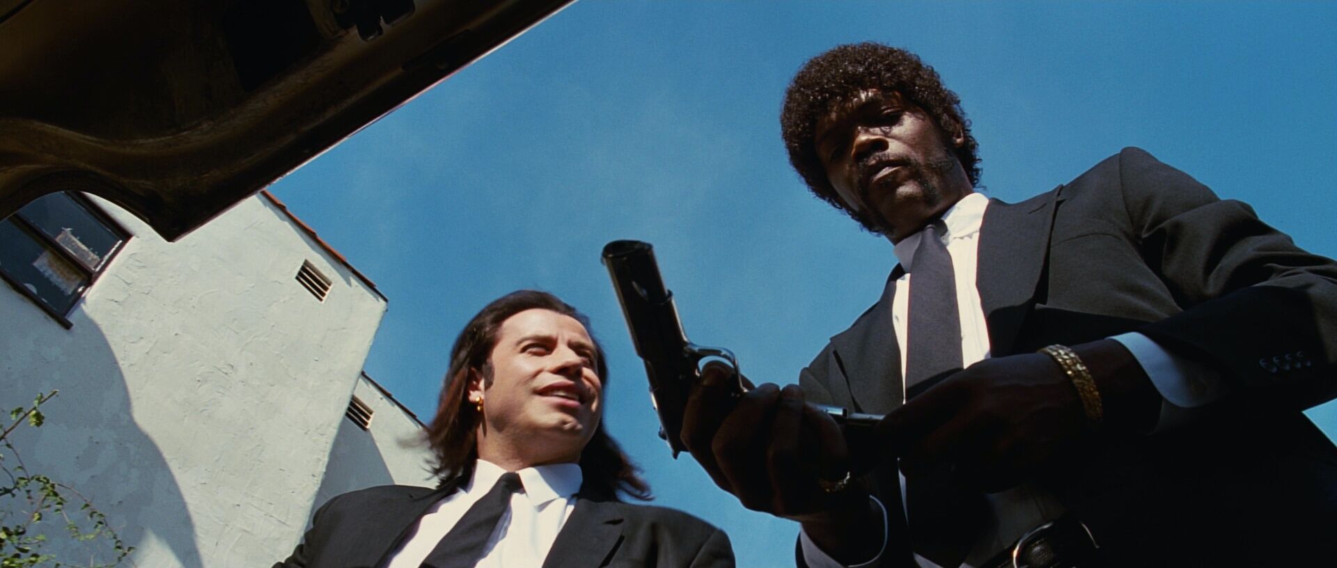 Aymmetrical Balance in Film Example Aymmetrical Balance Shot of Samuel L Jackson and John Travolta from Pulp Fiction