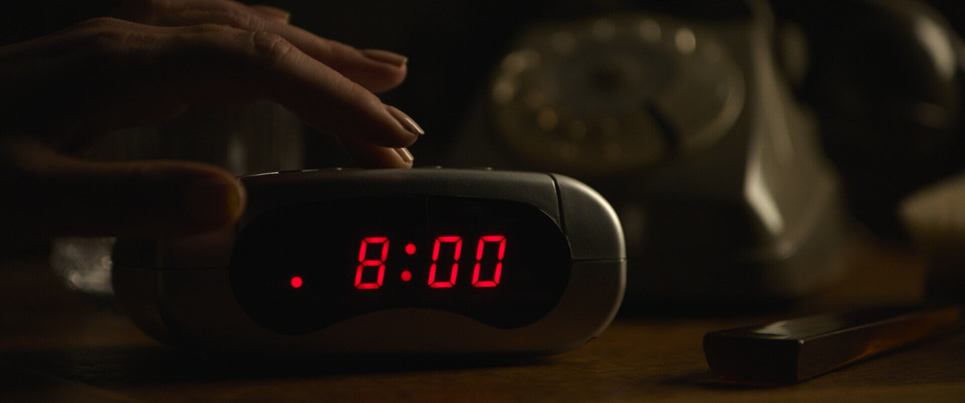Insert Shot Example Insert Shot of alarm clock from House of Gucci