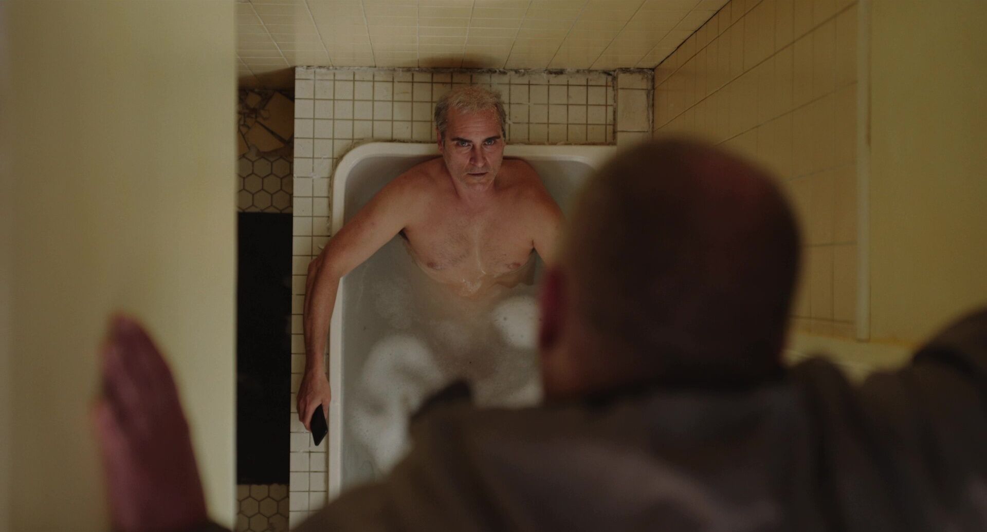 Over the Shoulder Shot Example Over the Shoulder Shot of Joaquin Phoenix from Beau is Afraid